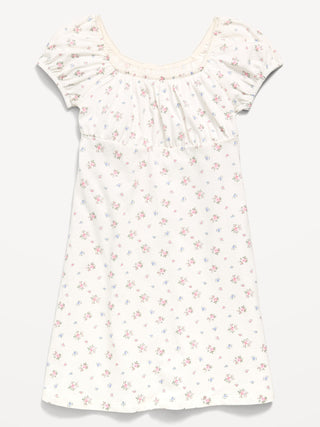 Vestido estampado entallado y con vuelo para niñas.