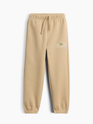 Joggers de corte relajado con logo y pretina elástica babyGap × Disney Toy Story.