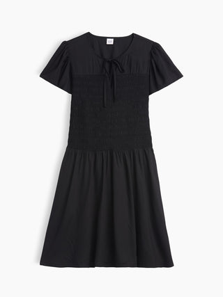 Vestido mini con smocking y manga volante.