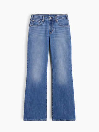 Jeans acampanados de corte relajado y tiro medio.