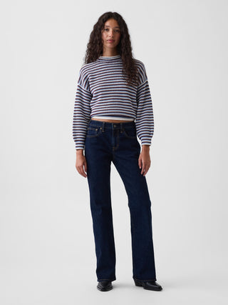 Jeans acampanados de corte relajado y tiro medio.