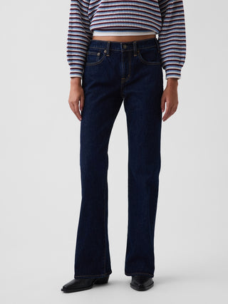 Jeans acampanados de corte relajado y tiro medio.