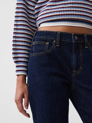 Jeans acampanados de corte relajado y tiro medio.