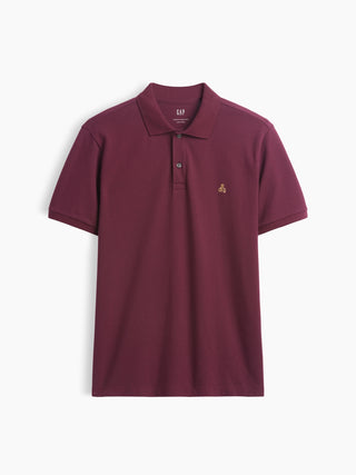 Playera polo de piqué elástico.