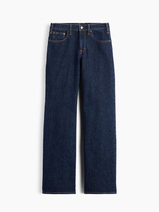 Jeans acampanados de corte relajado y tiro medio.