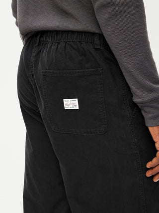 Pantalones de trabajo holgados.