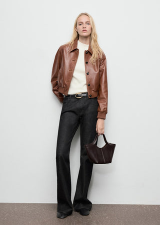 Jeans Acampanados Talle Medio con Bolsillos